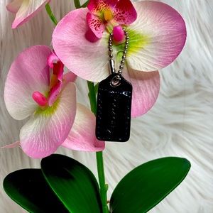 Mini Black Patent Leather Coach Hangtag